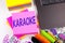 Writing text showing Karaoke made in the office with surroundings such as laptop, marker, pen. Business concept for Singing Karaok