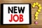 Writing text showing New Job. Business concept for Hiring Hire Recruitment written on tablet computer on the wooden background wit