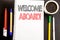 Writing text showing Welcome Aboard. Business concept for Greeting Join Member Written on notepad note paper background with space