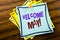 Writing text showing Welcome May. Business concept for Hello Month Greeting written on sticky note paper on the wooden background.