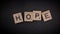 Writing the word Hope with wooden letters