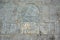 Written on the stone wall `Dio vede tutto`/`God sees everything` and masonic symbol above