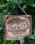 Written word namaste of wooden signboard