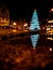 Wroclaw market square at night with some of walking people, glowing lanterns and beautifully and