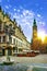 Wroclaw Market Square with Town Hall and street lantern lamp against stunning sunset sky.