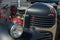 WROCLAW, POLAND - August 11, 2019: USA cars show: Dodge truck pickup 1941. Renovated black colour. Close up of engine and light