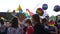 Wroclaw, Poland - October 3, 2020. Wroclaw Equality March. Equality march with LGBT symbols and flags. Masked men hold