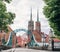 Wroclaw. Poland. View at Tumski island and Cathedral of St John the Baptist with bridge through river Odra