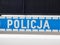 WrocÅ‚aw, Poland - June 8, 2019: Close-up of police logo on police car Policja means Police