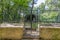 Wrought iron grille surrounding the cave with the representation of Jesus kneeling before an angel in the Garden of Olives