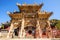 Wutaishan(Mount Wutai) scene-Carved stone torii in front of the Longquan temple door.