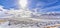 Wyoming countryside panoramic views during a blizzard with mountain with snow covered with overcast grey cloudy sky