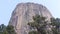 Wyoming, Devils Tower  A close up of the top of Devils Tower with several trees