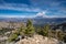 Wyoming mountain wildfire rages in the distance, view from a rid