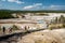 Wyoming, USA - July 26, 2020: Tourists hike along the boardwalks of Norris Geyser Basin in Yellowstone National Park