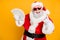 X-mas lottery win credit bank present for noel. Funky crazy hipster white bearded santa claus hold money fan show horned