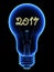 X-Ray lightbulb with sparkling 2017 digits inside isolated on black