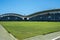 "GGL" rugby stadium from the inside with its perfectly mowed green lawn, its bleachers