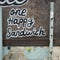 "One Happy Sandwich" - Details of Graffiti and Decay on Exterior Wall of an Urban Abandoned Restaurant Building.