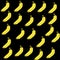 It's a yellow banana vector on a black background