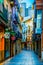 XATIVA, SPAIN, JANUARY 2, 2016:colourful narrow street in xativa town near valencia, which is famous for ist castle