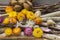 Xerochrysum bracteatum and Xeranthemum annuum dried flowers in bloom, flowering colorful decoration on wood