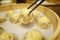 Xiao Long Bao with chopsticks Streamed Pork Dumplings Taiwan foo