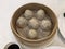 xiaolongbao Chinese steamed bun in bamboo steamer. Yumcha, Cantonese and Shanghai food style. Chinese cuisine.