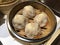 xiaolongbao Chinese steamed bun in bamboo steamer. Yumcha, Cantonese and Shanghai food style. Chinese cuisine.