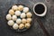 Xiaolongbao, traditional steamed dumplings and soy sauce. Xiao Long Bao buns on plate. Top view