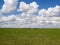 Xilinhot - Heard of horses grazing under wind turbines build on a vast pasture in Xilinhot, Inner Mongolia. Natural resources