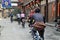 Xin Xing Zhen, China: Bikers Riding in Town