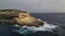 Xlendi tower cliffs on Gozo island after the storm aerial circular