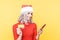 Xmas shopping online concept. Christmas girl holding credit card and phone.