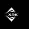XRK abstract monogram shield logo design on black background. XRK creative initials letter logo