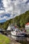 Yacht arriving at the harbour at Crinan, Scotland, United Kingdom