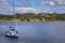 Yacht arriving at the harbour at Crinan, Scotland, United Kingdom