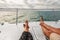 Yacht boat lifestyle couple relaxing on cruise ship in Hawaii holiday . Two tourists feet relax getaway enjoying vacation