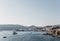 Yacht and boats heading towards Platis Gialos, Mykonos, Greece