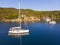 Yacht in a calm bay from above