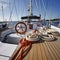 Yacht deck with lifebuoy sail, ropes and wheel. AI generative.