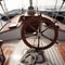 Yacht deck with lifebuoy sail, ropes and wheel. AI generative.