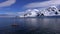 The yacht emerges from the bay near the glacier. Andreev.