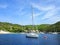 Yacht in an island bay with beach