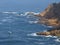 A yacht leaves the entrance to the lagoon, Knysna