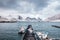 Yacht moored with jetty in surrounded mountain on cloudy