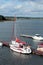 The yacht is parked on a pier in the bay. Lonely ship on an marina