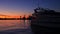 Yacht port and beautiful sunset.Sailboat harbor, many beautiful moored sail yachts in the sea
