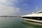 The yacht prow with blue sky and green water