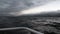 Yacht rails on background of dark gray clouds in sky and storm on Lake Baikal.